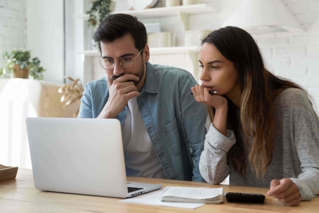 Couple Reviewing How an Executor Mishandled the Estate of a Loved One
