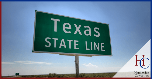 A green rectangular highway sign that reads 